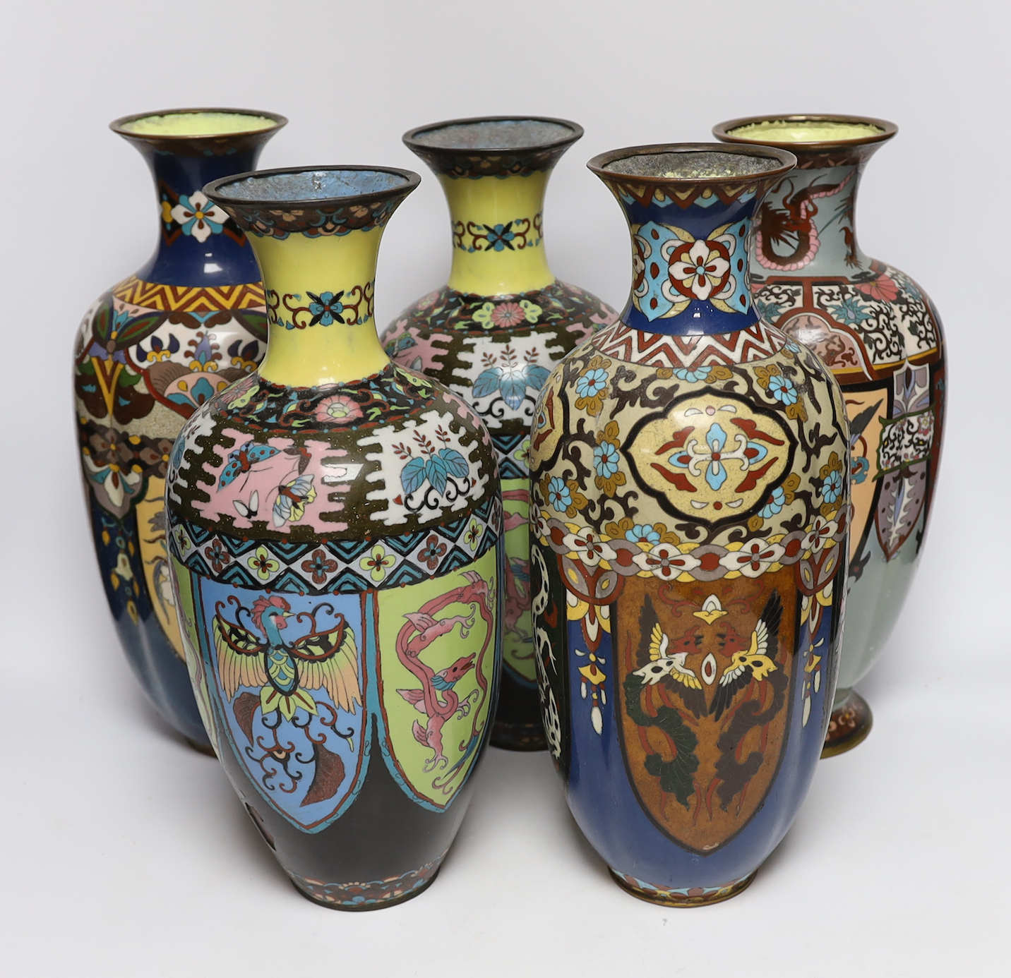 A pair of large Japanese cloisonné enamel vases, together with three similar vases, early 20th century, tallest 36.5cm high (5)